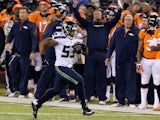 Outside linebacker Malcolm Smith #53 of the Seattle Seahawks runs back an interception off quarterback Peyton Manning of the Denver Broncos on February 2, 2014