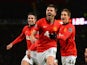 Michael Carrick of Manchester United celebrates scoring his team's second goal with Adnan Januzaj (R) during the Barclays Premier League match between Manchester United and Fulham at Old Trafford on February 9, 2014