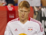 Markus Holgersson of the New York Red Bulls plays the ball against the Houston Dynamo during the match at Red Bull Arena on August 10, 2012
