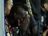 Mario Balotelli of Milan crying on the bench after being replaced during the Serie A match between SSC Napoli and AC Milan at Stadio San Paolo on February 8, 2014