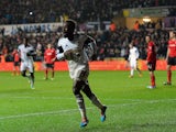 Swansea's Nathan Dyer celebrates after scoring this team's second goal against Cardiff during their Premier League match on February 8, 2014