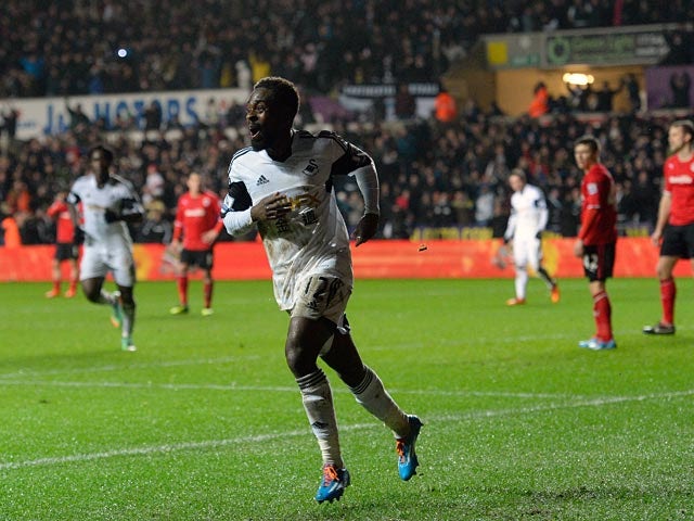 Swansea's Nathan Dyer celebrates after scoring this team's second goal against Cardiff during their Premier League match on February 8, 2014