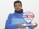 Peterborough's Nicky Ajose with his Player of the Month award on February 6, 2014