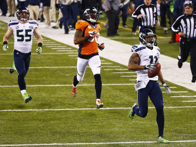 Wide receiver Percy Harvin of the Seattle Seahawks returns the second half kickoff for 87 yards during Super Bowl XLVIII on February 2, 2014