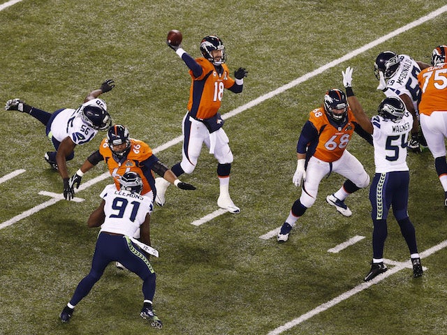 Quarterback Peyton Manning #18 of the Denver Broncos throws an interception during the first quarter of Super Bowl XLVIII on February 2, 2014