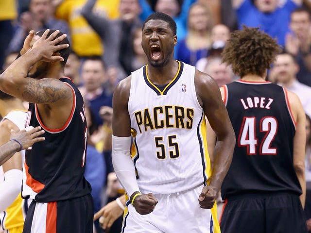 Roy Hibbert #55 of the Indiana Pacers celebrates during overtime in the118-113 win over the Portland Trailblazers at Bankers Life Fieldhouse on February 7, 2014