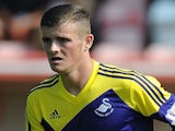Rory Donnelly of Swansea City in action during the Pre Season Friendly match between Exeter City and Swansea City at St James' Park on July 21, 2013