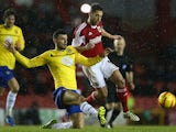 Sam Baldock (R) of Bristol City is challenged by Conor Thomas (L)of Coventry City during the Sky Bet League One match on February 4, 2014