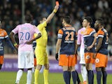 Montpellier's Siaka Tiene is sent off against Evian during their Ligue 1 match on February 8, 2014