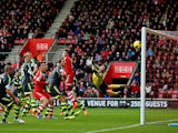 Asmir Begovic of Stoke watches Ricky Lambert's free kick fly past him to make it 1-0 during the Barclays Premier League match between Southampton and Stoke City at St Mary's Stadium on February 8, 2014
