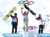 Norway's Staale Sandbech (silver), USA's Sage Kotsenburg (gold) and Canada's Mark McMorris (bronze) on the podium for the men's slopestyle final on February 8, 2014.