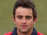 Stephen Parry of Lancashire CCC wears the Yorkshire 40 during a pre-season photocall at Old Trafford on April 2, 2013