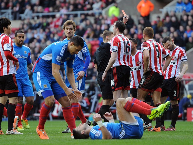 Wes Brown of Sunderland is sent off by referee Mike Jones during the Barclays Premier League match between Sunderland and Hull City at Stadium of Light on February 08, 2014