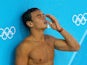 Tom Daley enjoying a shower at the Olympics in London on July 30, 2012.