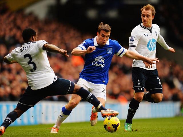 Seamus Coleman of Everton is challenged by Danny Rose and Christian Eriksen of Tottenham Hotspur during the Barclays Premier League match between Tottenham Hotspur and Everton at White Hart Lane on February 9, 2014