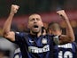Inter's Walter Samuel celebrates after scoring the opening goal against Sassuolo on February 9, 2014