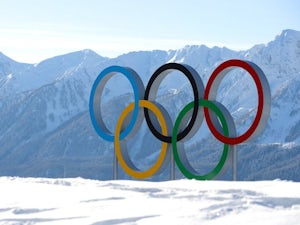 IOC bans Ukrainian athletes from wearing black armbands