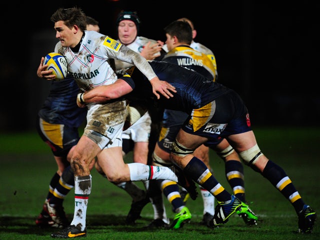 Tigers player Toby Flood makes a break during the Aviva Premiership match between Worcester Warriors and Leicester Tigers at Sixways Stadium on February 7, 2014