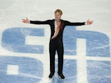 Russia's Yevgeny Plushenko smiles after performing in the Men's Figure Skating Team Short Program at the Iceberg Skating Palace during the Sochi Winter Olympics on February 6, 2014
