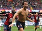 Genoa's Alberto Gilardino celebrates after scoring the equaliser against Udinese during their Serie A match on February 16, 2014