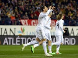 Real Madrid's Portuguese forward Cristiano Ronaldo celebrates after scoring during the Spanish Copa del Rey semifinal second-leg football match Club Atletico de Madrid vs Real Madrid CF at the Vicente Calderon stadium in Madrid on February 11, 2014