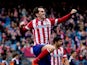 Diego Godin of Atletico de Madrid jumps, celebrating scoring their third goal during the La Liga match between Club Atletico de Madrid and Real Valladolid CF at Vicente Calderon Stadium on February 15, 2014