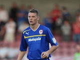 Ben Nugent of Cardiff City in action during the Capital One Cup 1st Round match between Northampton Town and Cardiff City at Sixfields on August 14, 2012