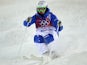 France's Benjamin Cavet competes in the Men's Freestyle Skiing Moguls finals at the Rosa Khutor Extreme Park during the Sochi Winter Olympics on February 10, 2014