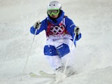 France's Benjamin Cavet competes in the Men's Freestyle Skiing Moguls finals at the Rosa Khutor Extreme Park during the Sochi Winter Olympics on February 10, 2014