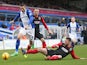 Federico Macheda of Birmingham tangles with Anthony Gerrard of Huddersfield Town during the Sky Bet Championship match between Birmingham City and Huddersfield Town at St Andrews (stadium) on February 15, 2014
