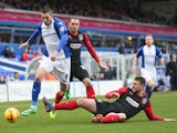 Federico Macheda of Birmingham tangles with Anthony Gerrard of Huddersfield Town during the Sky Bet Championship match between Birmingham City and Huddersfield Town at St Andrews (stadium) on February 15, 2014