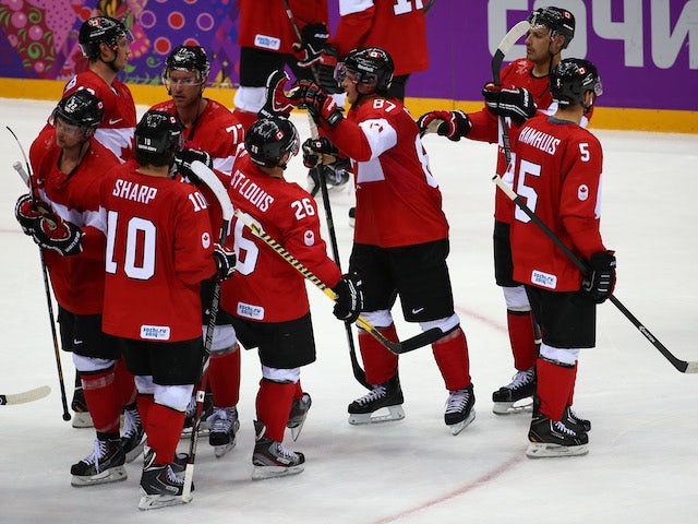 Canada celebrates after beating Norway 3-1 during the Men's Ice Hockey Preliminary Round Group B game on day six of the Sochi 2014 Winter Olympics on February 13, 2014