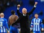 Wigan manager Uwe Rosler celebrates with the fans after the FA Cup Fifth Round match between Cardiff City and Wigan Athletic at Cardiff City Stadium on February 15, 2014