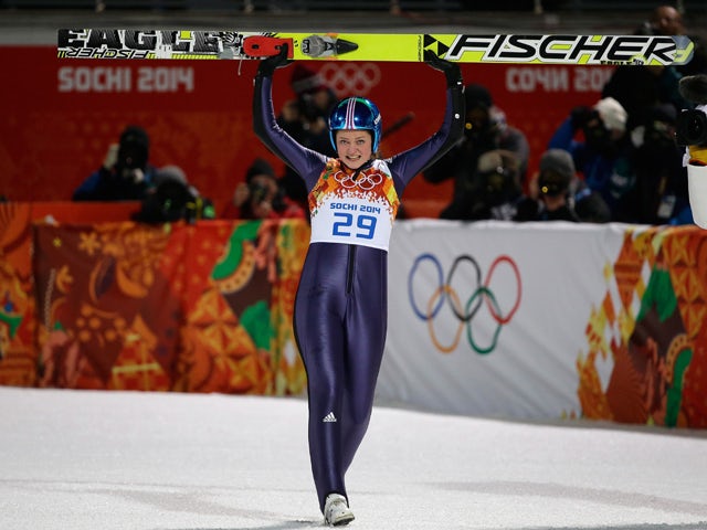 Carina Vogt of Germany celebrates winning the gold medal in the Ski Jumping Ladies Normal Hill Individual on day 4 of the Sochi 2014 Winter Olympics at the RusSki Gorki Ski Jumping Center on February 11, 2014