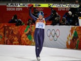 Carina Vogt of Germany celebrates winning the gold medal in the Ski Jumping Ladies Normal Hill Individual on day 4 of the Sochi 2014 Winter Olympics at the RusSki Gorki Ski Jumping Center on February 11, 2014