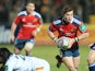 Munster's scrum-half Cathal Sheridan runs with the ball during the rugby union H CUP match between Perpignan and Munster on December 14, 2013