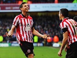 Sheffield United's Chris Porter celebrates after scoring his team's second goal against Nottingham Forest during their FA Cup fifth round match on February 9, 2014