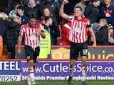 Sheffield United's Conor Coady celebrates after scoring his team's opening goal against Nottingham Forest during their FA Cup fifth round match on February 9, 2014