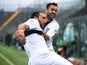 Parma's Cristian Molinaro celebrates with teammate Raffaele Palladino after scoring the opening goal against Atalanta during their Serie A match on February 16, 2014
