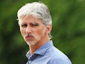 Former F1 World Champion Damon Hill is seen during qualifying for the Chinese Formula One Grand Prix at the Shanghai International Circuit on April 13, 2013