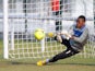 Ghanaian first goalkeeper Daniel Agyei warms up at Ngouoni football field in Gabon on February 2, 2012