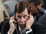 David Poile works the phones during the 2013 NHL Draft at the Prudential Center on June 30, 2013