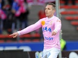 Evian's French forward Kevin Berigaud celebrates after scoring during the French L1 football match between Evian (ETGFC) and Lille (LOSC) on February 16, 2014