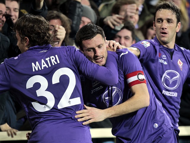 Manuel Pasqual of ACF Fiorentina celebrates after scoring a goal during the TIM Cup match between ACF Fiorentina and Udinese Calcio at Stadio Artemio Franchi on February 11, 2014