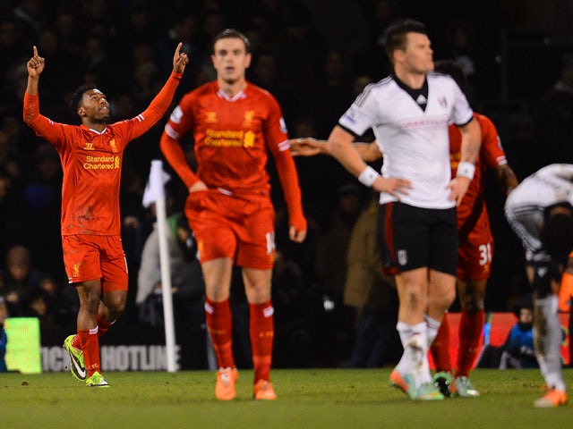 Daniel Sturridge of Liverpool celebrates scoring their first goal during the Barclays Premier League match between Fulham and Liverpool at Craven Cottage on February 12, 2014