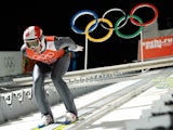 Austria's Gregor Schlierenzauer prepares before his Men's Ski Jumping Large Hill second Official training jump at the RusSki Gorki Jumping Center during the Sochi Winter Olympics on February 13, 2014