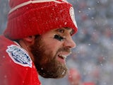 Henrik Zetterberg #40 of the Detroit Red Wings takes a break during the first period of the 2014 Bridgestone NHL Winter Classic at Michigan Stadium on January 1, 2014