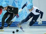 Great Britain's Jack Whelbourne falls as he competes in the Men's Short Track 1500 m Final at the Iceberg Skating Palace during the Sochi Winter Olympics on February 10, 2014