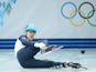 Great Britain's Jack Whelbourne falls as he competes in the Men's Short Track 1500 m Final at the Iceberg Skating Palace during the Sochi Winter Olympics on February 10, 2014