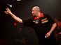 James Wilson of England in action during his first round match against Christian Kist of Holland during the BDO Lakeside World Professional Darts Championships at Lakeside Complex on January 07, 2014